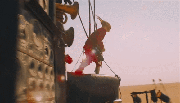 mad-max-fury-road-awesome-guitar-guy.gif